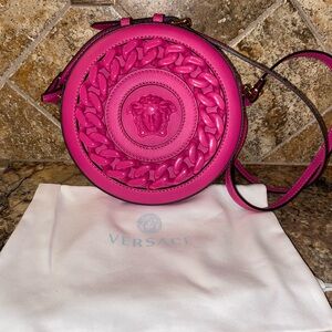 Versace Pink Crossbody Bag with Embossed Design and Circular Shape
